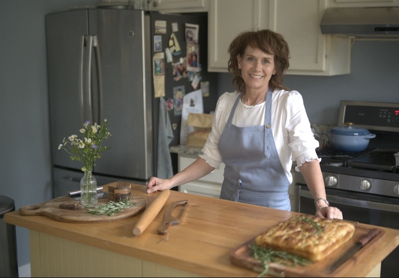 Lise in kitchen baking